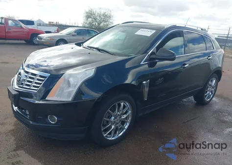 2013 Cadillac Srx Premium Collection z USA, uszkodzony, nr VIN 3GYFNJE39DS611190